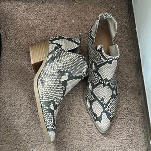 Snake ankle boots.